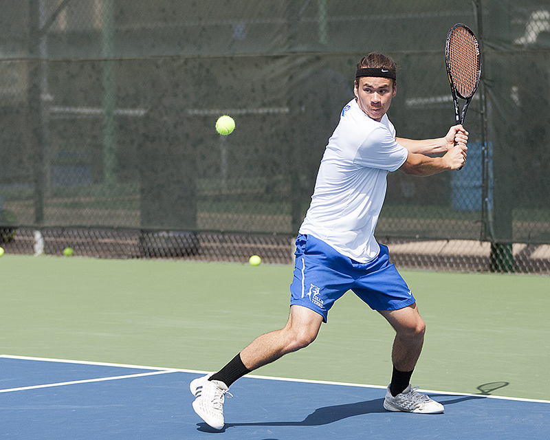Collin College tennis player readying a backhand