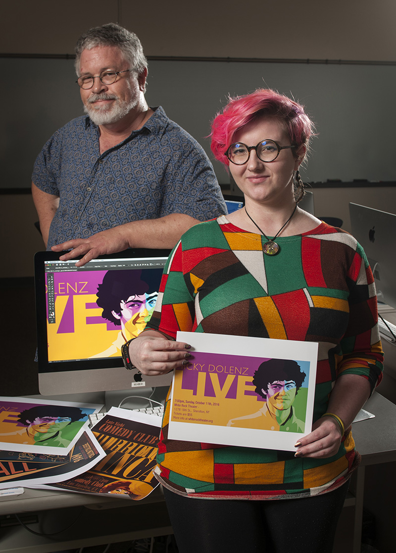 associate professor Kevin Kreneck and student Cari Croninger with her winning artwork