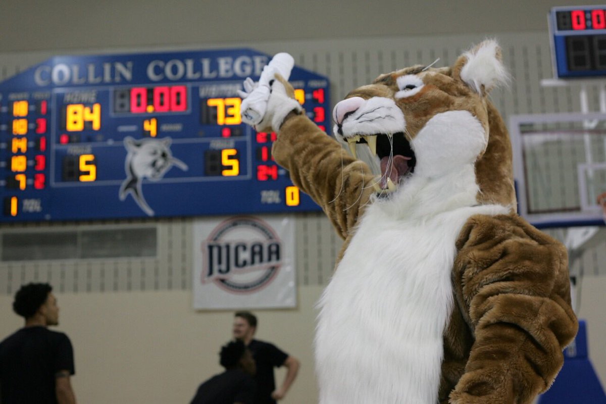 Collin Cougar points to winning score.
