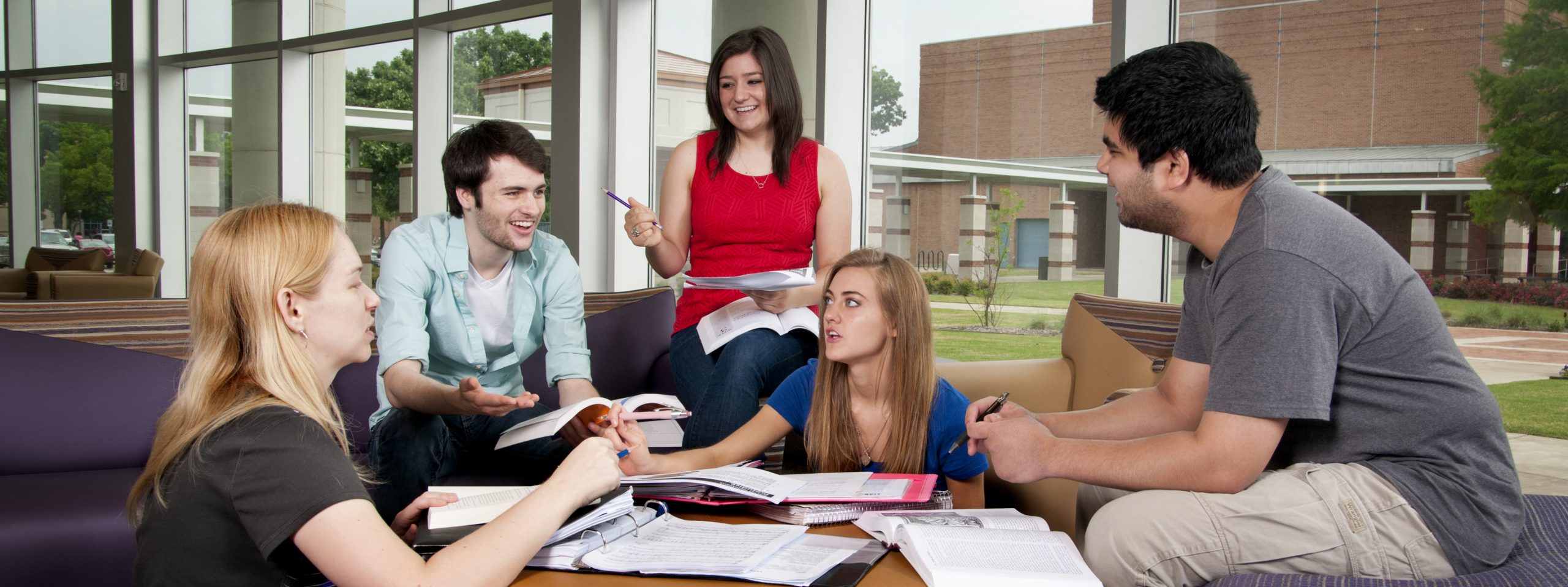 Students on campus in library