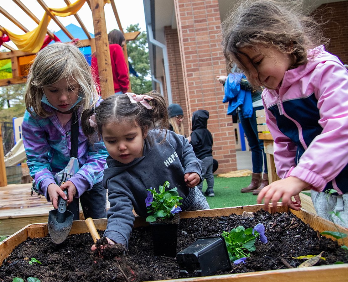 Children in the Collin College Lab School garden