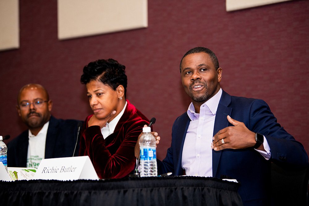 Pastor Richie Butler (right) of St. Luke Community United Methodist Church in Dallas answers a question during a panel at the Dr. Martin Luther King Jr. Power Leadership Breakfast, Jan. 14 at Collin College’s Plano Campus. Butler was joined by Pastor Kyle Ray of Sent Church and Dr. Cheryl Jackson, founder of Minnie’s Food Pantry, both of which are in Plano.